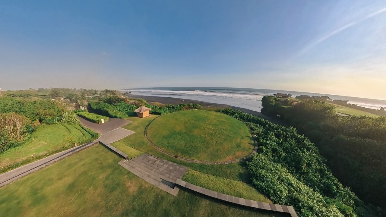 The circular departure lawn at Soori, between the resort gardens and the black sand of Kelating Beach